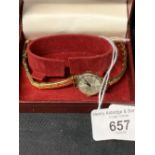Watches: 9ct. Hallmarked gold Rotary cocktail watch with plated bracelet, boxed.