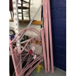 21st cent. Children's metal framed single beds, pink. A pair.