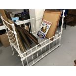 19th cent. Painted cast iron child's cot that converts to a bed. 50ins. x 29ins. x43ins.