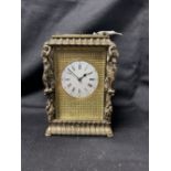 Clocks: c1870 French brass repeater carriage clock, once silvered. White enamel face with Roman