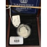 Silver Coins: Queen Elizabeth Sapphire Jubilee proof £5 2017 Guernsey embellished, boxed. 28g.