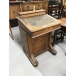 Late 19th cent. Walnut davenport in need of restoration.