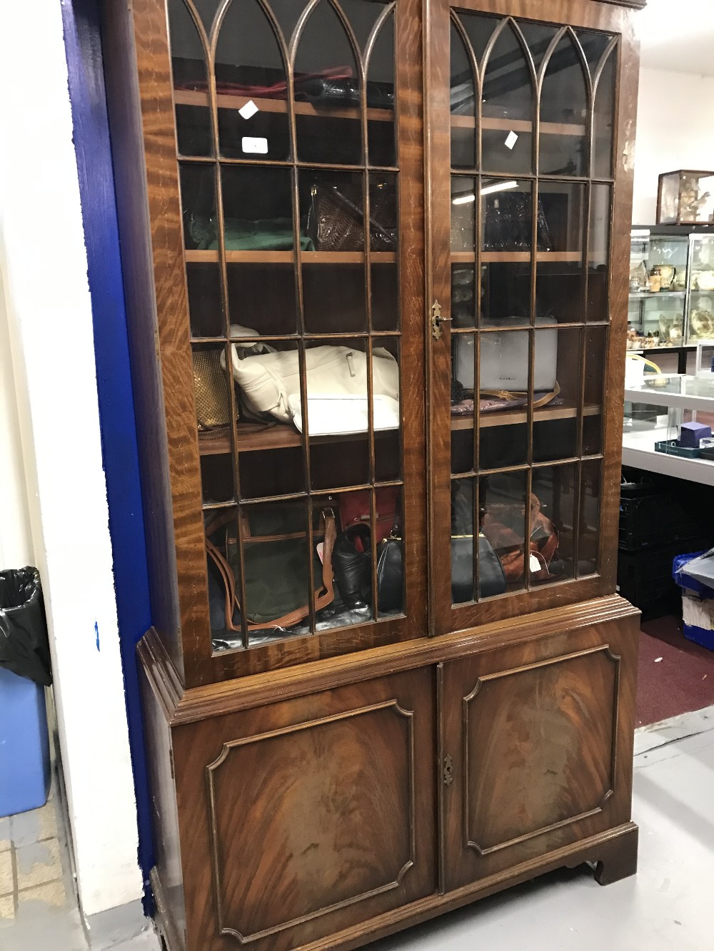 20th cent. Glazed mahogany bookcase.