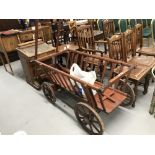 20th cent. Pine dog drawn dog cart, with iron rimmed wheels, used in the past mainly for