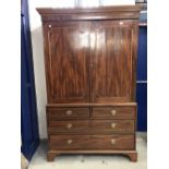 Late 18th/early 19th cent. mahogany linen press, inlaid with ebony and boxwood. The top section