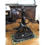 Sculpture: Early 20th cent. Bronze of Diana the Huntress with her hounds. On marble base,