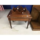 19th cent. Mahogany ladies bidet converted into a side table, plus a later mahogany bottle carrier.