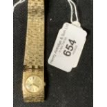 Watches: Hallmarked gold 9ct. Bulova ladies closed bracelet link. 37.23g inclusive.