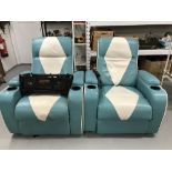 20th cent. Two blue and white leather Fox Hunter electric reclining movie chairs.