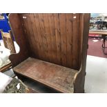 19th cent. Pitched pine settle. 48ins. x 19ins. x 54ins.