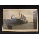 R.M.S. TITANIC: Extremely rare real photo postcard produced privately showing Titanic from the stern