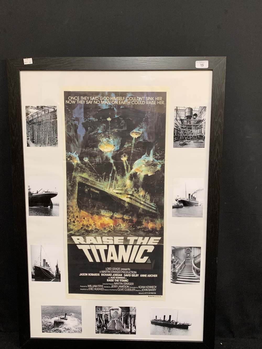 R.M.S. TITANIC: Raise the Titanic promotional poster mounted alongside a series of reproduction