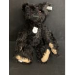 R.M.S. TITANIC: Steiff black replica of 1912 mourning bear, without box. 16ins.