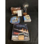 R.M.S. TITANIC: Modern Titanic collectables, tapes, CDs to include pole cast figure of E.J. Smith.