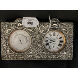 Pocket clock and barometer Benzie of Cowes in hinged unmarked silver fronted stand. 7½ins. x 4½ins.