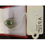 Jewellery: 18ct. Gold and platinum tested ring cabochon emerald, diamond above and below.