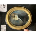 Early 19th cent. Miniature of a gentleman painted on ivory in black and gold tollware mount with