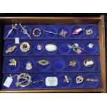 Costume Jewellery: Twenty three white metal and yellow metal brooches, various makers. One