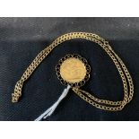 Gold Coins: Victoria 1883 mounted in a pendant chain with 9ct. Convention mark. 13.2g. Inclusive