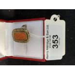 Jewellery: 18ct. Tested carved coral ring, size R, 22 and 15mm. 6.2g.