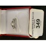 Jewellery: 18ct. Hallmarked Diamond baguette single stone ring. Centre 0.63ct. Baguette .18ct.