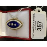 Jewellery: 18ct. Gold ring, three diamonds on blue white enamel. Diamond weight approx. 0.40ct. Size