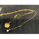 Hallmarked Jewellery: Two 9ct. gold necklets, one with a rock crystal pendant attached, the other