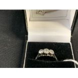 Hallmarked Jewellery: Platinum ring claw set with three graduated brilliant cut diamonds 0.30ct,