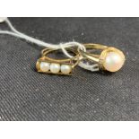 Jewellery: Two yellow metal rings, one set with three cultured pearls and one set with a single