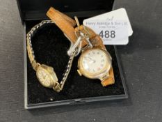 Watches: Two 9ct gold ladies watches, one c1920 on leather strap, the other being a Cannonade on a