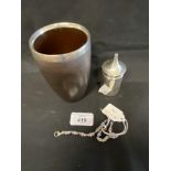 Royal Doulton beaker leather Jack design with a silver rim, hallmarked Chester 1899, a silver pepper