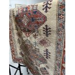 Carpets & Rugs: Early 20th cent. Eastern Turkish carpet, ivory ground with three large central