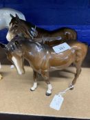 Beswick: Bois Roussel brown gloss racehorse, plus another facing right. (2)