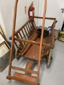20th cent. Pine dog drawn dog cart, with iron rimmed wheels, used in the past mainly for