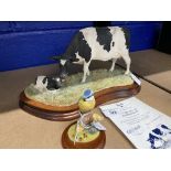 20th cent. Ceramics: Border Fine Arts. Holstein Friesian cow and calf on treen base No. 824 of 1750,