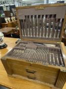 20th cent. Oak canteen with fitted lid and two drawers, contains 100 pieces of flatware, eight of