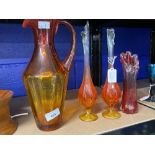 Red Art Glass: Tall decanter, two slender vases, plus one other.
