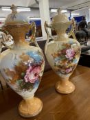 Early 20th cent. Mantel vases in the form of two handled urns, with covers, transfer decoration of