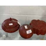 Chinese 20th cent. Carved red lacquer treen box of geometric form, another spherical painted, plus