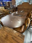 19th cent. Oval extending dining table with one leaf and a set of 6 Maple & Co bar back dining