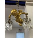 Lighting: Early 20th cent. Rococo style ceiling light in the form of a winged Putti holding a