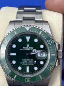 Watches: Rolex 2019 'Hulk' Submariner, with warranty card. The Hulk is one of the hardest Rolex's to