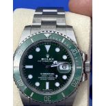 Watches: Rolex 2019 'Hulk' Submariner, with warranty card. The Hulk is one of the hardest Rolex's to