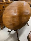 19th cent. Mahogany tilt top tripod table with bird cage mechanism, on turned column support. 28ins.