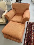 20th cent. Armchair and footstool upholstered in woven terracotta pattern with current Fire Safety