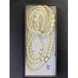 Jewellery: Triple row necklet of graduated simulated pearls, plus bracelet also of simulated