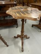 19th cent. Walnut inlaid Backgammon table of serpentine form, twisted central column of tripod base.