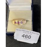 Hallmarked Gold: Gents 9ct set with three rubies total 0.30ct weight inclusive 4.8g.