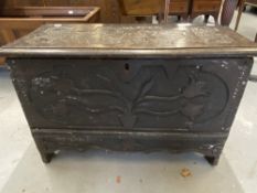 Late 17th/early 18th cent. Miniature oak coffer with carved stylised floral decoration to front