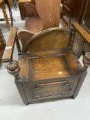 19th cent. Oak monk's chair with applied beading and quartered sunbeam carvings, circular table top.